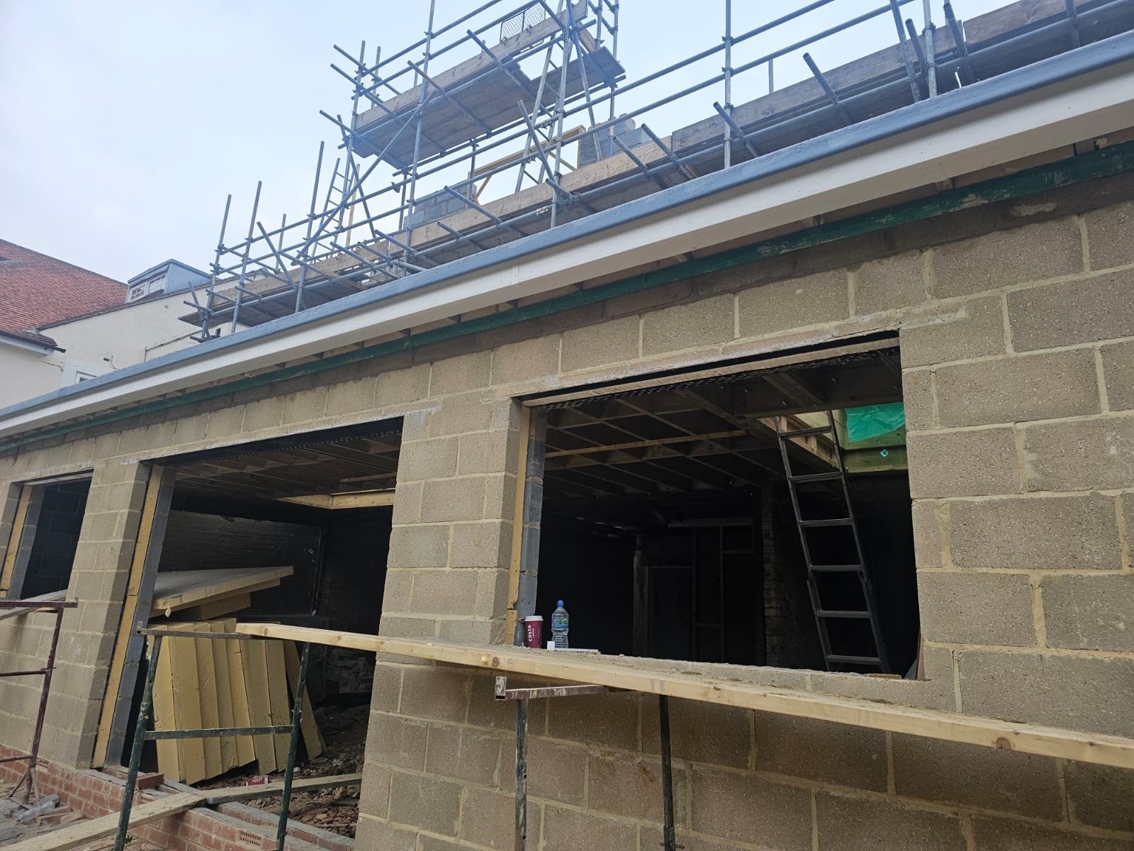 Blockwork walls and openings under construction on an extension