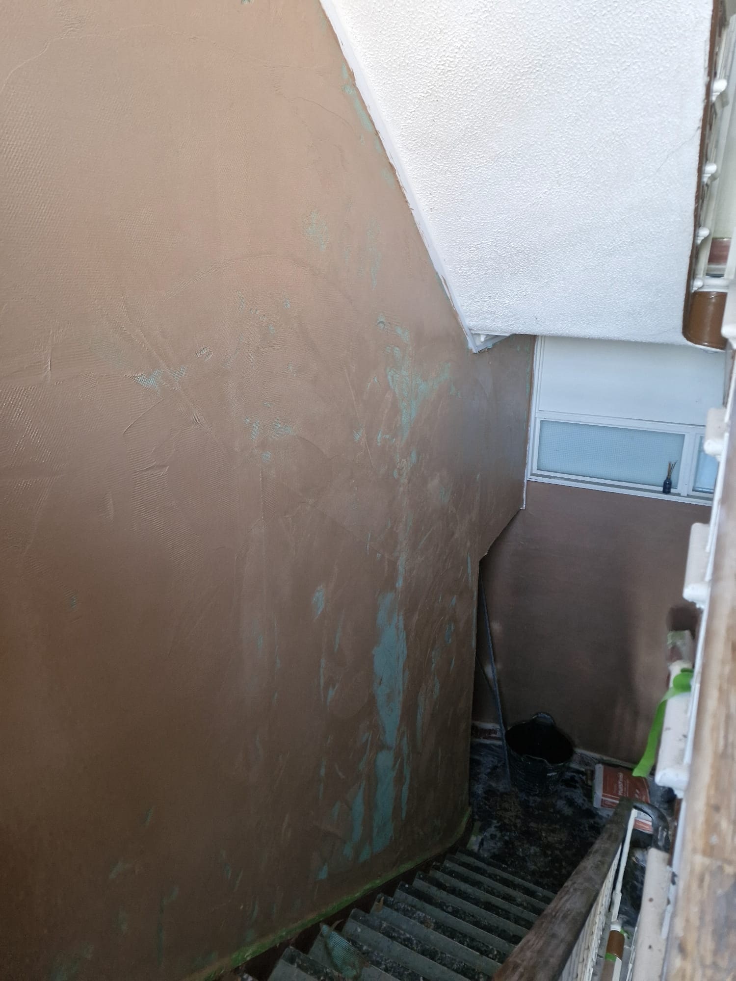 External wall with a fresh rendered finish